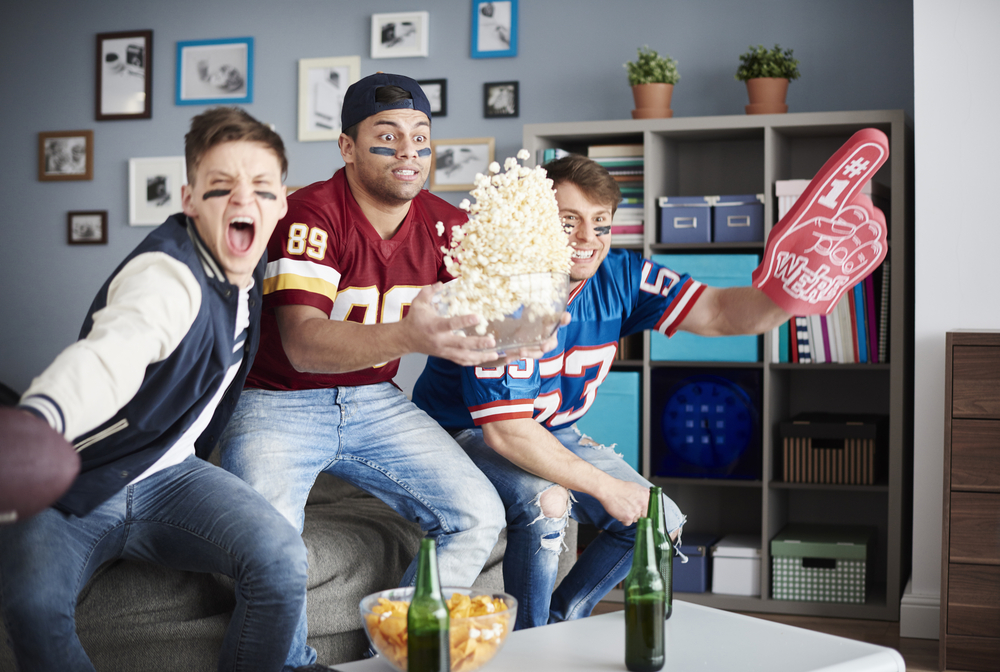 Men excited about Super Bowl, sports, celebration